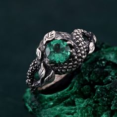 🌟 Warm Greetings, Jewelry Enthusiasts! 🌟 Step into a world where elegance meets personalization with our handcrafted silver rings. Each piece is a testament to unique artistry, blending mystical charm with modern finesse. Our collection offers a special touch for those who adore distinctive and thoughtfully designed jewelry. 🌈 Customization at Your Fingertips: Choose your perfect ring size and select from a variety of enchanting gemstones using our user-friendly dropdown menus. We delight in offering you the chance to create a ring that resonates with your personal style and story. ✨ Design It Your Way: Dreaming of a specific look? We're here to make it happen! Whether it's altering dimensions, adding extra gemstones, or choosing a different material, reach out to us. Your imagination i Green Snake Ring Gift, Green Snake Ring For Gift, Mystical Green Rings Perfect For Gifts, Unique Emerald Ring For Promise, Unique Emerald Promise Ring, Sterling Silver Fantasy Ring, Handmade Emerald Spiritual Rings, Handmade Spiritual Emerald Ring, Unique Emerald Ring As A Gift