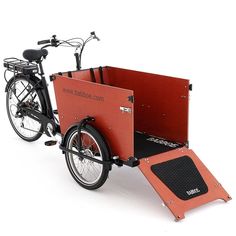 a bike with a trailer attached to the back is shown in front of a white background