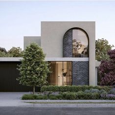 an architectural rendering of a modern house with large arched windows and brickwork on the front