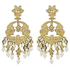 A pair of earrings made in 22K gold in chandbali design, the design comes from traditional nizam jewellery of India. The designs borrow its ethos from long lasting Indian culture. the earrings are set with natural syndicate mines diamonds having good lustre and shade. The big chand Balis are hanged from small flower studs and is further suspended with diamond pear drops followed by pearls below. The earrings are enamelled at back in red and green colours making a testament to the purity of gold and detailing in craftsmanship. The enamel colours are bright and full with colour which only comes if the gold purity is at the top most quality. The earrings are big and have clips at the back to make the owner comfortable while wearing these. The earrings have nearly 35gms of gold and around 6.70 Luxury Ornate Meenakari Jewelry, Luxury Chandbali Pearl Necklace, Luxury Temple Jewelry Earrings With Meenakari, Chandbali Earrings Gold Kameswari Jewellers, Luxury Elegant Chandbali Diamond Earrings, Luxury Cutdana Chandbali Pearl Necklace, Luxury Chandbali Danglers With Pearl Drop, Luxury Hallmarked Chandbali Necklaces, Luxury 22k Gold Chandbali Kundan Necklace