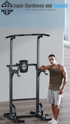 a man standing next to a squat machine