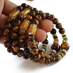 Natural Tiger Eye Lucky Stone Mantra Prayer Beads Bracelet AtPerr - AtPerry's Healing Crystals Casual Round Beaded Bracelets For Meditation, Casual Beaded Bracelets For Meditation, Casual Multicolor Beaded Bracelet, Casual Brown Beaded Stretch Bracelet, Casual Stretch Bracelet With Round Beads For Meditation, Casual Beaded Stretch Bracelet For Meditation, Casual Multicolor Jewelry For Meditation, Casual Brown Stretch Bracelet For Healing, Casual Brown Jewelry With Letter Beads