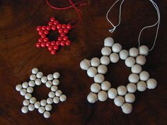 some white and red beads are on a table