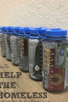 there are many bottles with measuring tape on them