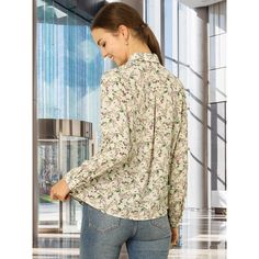 Let your wardrobe blossom with this graceful floral shirt. Whether you're in the office or out on town, this ditsy floral-printed shirt is perfect for any occasion. Wear this shirt out for a breezy look. Pair it with skirts or skinny jeans and high-heeled sandals to finish your look. The graceful floral print makes this blouse a lovely addition to your weekend wardrobe. Feminine Floral Print Button-up Blouse, Feminine Floral Print Button-up Shirt, Collared Floral Print Tops For Office, Floral Print Collared Top For Office, Daywear Floral Print Button-up Shirt, Casual Floral Print Blouse For Office, Collared Floral Print Blouse For Work, Printed Button-up Office Shirt, Spring Floral Print Workwear Shirt