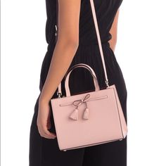 50% Off Retail Of $328 Nwt Kate Spade Hayes Satchel Small Leather Purse Bag Rosy Cheeks Feminine Details Such As A Tassel Bow Make This Leather Bag Perfect To Pair With Flowy Weekend Outfits. The Detachable Shoulder Strap Also Gives You The Option To Wear This Bag Crossbody Style If Desired. Interior Features Dual Compartments And Zip Pocket - Exterior Features Tassel Bow Detail - Approx. 8" H X 10" W X 5" D Approx. 5" Handle Drop, 22.5" Strap Elegant Spring Shopping Bags, Feminine Kate Spade Leather Bag, Kate Spade Handheld Shoulder Bag, Elegant Kate Spade Handheld Shoulder Bag, Designer Formal Bags For Spring, Kate Spade Elegant Bag With Detachable Strap, Elegant Kate Spade Bag With Detachable Strap, Kate Spade Formal Bags For Spring, Feminine Kate Spade Bags For Formal Occasions