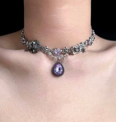 This vintage courtly elegance purple cubic zirconia pendant necklace, adorned with a star pendant, creates an elegant and uniquely stylish appearance, making it a must-have for fashion enthusiasts. - Material: Alloy + Titanium Plating, long-lasting color retention - Necklace Length: 43cm adjustable size - Free Shipping - Handcrafted with care - Comes in a beautiful gift box, perfect for gifting - Order Processing Time: 3-5 days - Order Delivery Time: 5-15 days Purple Goth Accessories, Gothic Purple Metal Jewelry, Mystical Silver Choker Necklace, Silver Amethyst Necklaces For Party, Purple Metal Clavicle Chain Necklace, Gothic Purple Necklace For Party, Purple Gothic Necklace For Party, Gothic Crystal Jewelry For Gift, Purple Metal Choker For Gift