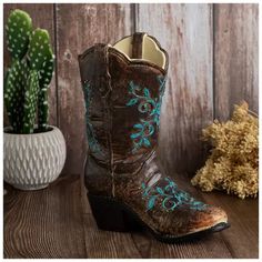 Brown & Turquoise Floral Cowboy Boot Vase | Hobby Lobby | 2059608 Cowboy Decor Ideas, Western Centerpiece Ideas Cowboy Theme, Western Centerpiece Ideas, Boot Vase