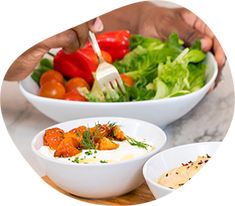 two bowls filled with different types of food