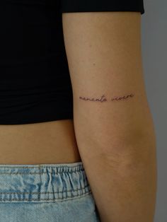 memento vivere written in fine line on the back of the arm Quote Tattoos Back Of Arm, Text Tattoos For Women Arm, Fine Line Tattoo Words Italian, Back Of Arm Writing Tattoo, Back Of Arm Quote Tattoo, Back Of Arm Small Tattoo, Fine Word Tattoo, Momento Vivere Tattoo Fonts, Fine Line Tattoos Words