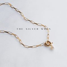 This pearl pendant necklace is timeless and chic. Classic and versatile this necklace comes in a thick gold chain with a charm holder that opens. •Thick gold link chain•Shell pearl drop•A stylish charm holder clasp that opens to remove the pearl•24kt gold plated -lead, nickel & cadmium free•Heavy plating, tarnish resistant, water friendly Thick Gold Chain, Charm Holder, Gold Link Chain, Gold Link, 24kt Gold, Pearl Pendant Necklace, The Pearl, Pearl Drop, Pearl Pendant