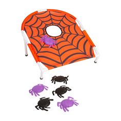 halloween spider web game with purple and black crabs