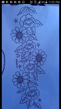 a drawing of flowers on a sheet of paper