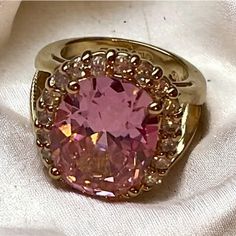 Jacqueline Kennedy Vintage Pink Kunzite & Diamonds Ring - Size 6 Signature Jacqueline Bouvier Kennedy Carefully Crafted By Camrose & Cross Gorgeous 24k Gold Plated On 925 Sterling Silver. Center Pink Simulated Kunzite Stone That Measures Approximately 12mm X 16 Mm. It Is Accented With 20 Round Simulated Diamonds. Stunning. Tarnish Free. Never Worn. Elegant Pink Gemstone Ring, Elegant Pink Gold Rings With Accent Stones, Dazzling Jewelry With Gemstone Accents, Elegant Pink Gold Jewelry With Center Stone, Dazzling Pink Rings For Formal Occasions, Dazzling Pink Formal Rings, Elegant Pink Ring For Anniversary, Elegant Pink Rings For Anniversary, Elegant Pink Jewelry With Center Stone