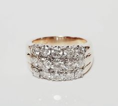 an image of a ring with diamonds on it