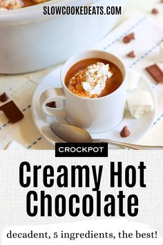 creamy hot chocolate with whipped cream in a white cup