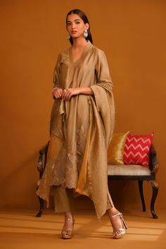 Camel straight kurta with floral applique patch work on the hem and sleeves. Paired with a trouser and dupatta. - Aza Fashions Applique Kurta, Jacquard Suit, Woven Shawls, Nishat Linen, Trouser Pattern, Jacquard Shirt, Jacquard Design, Cotton Trousers, Suit Fabric