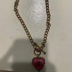 Never Worn Great Condition Heart Shaped Pink Jewelry With Logo Charm For Gifts, Pink Heart-shaped Chain Jewelry, Vintage Pink Heart Necklaces, Chic Pink Chain Jewelry, Trendy Pink Metal Necklace, Pink Metal Jewelry Fashion Accessory, Pink Metal Jewelry As Fashion Accessory, Cute Pink Jewelry With Chain Detail, Cute Pink Jewelry With Chain