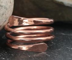 "Pure Copper Wrap Ring, Copper Band Ring, Hammered Ring, Dainty Handmade Ring, Arthritis And Healing Ring, Wire Wrap Ring, Copper Jewelry Metal: Copper Ring Style : Stacking Ring Ring Size : 3- 15 US Weight : 5-10 Gm Approx Ring Size: All Size Available : Our Goal is 100% Customer Satisfaction :- -: We use Pure Copper Jewelry -: All Products Description are 100% Exact:- All Our Jewelry Is 925 Stamped. Our products are totally handmade and made with high-quality gemstones and sterling silver. FAS Handmade Rose Gold Toe Ring, Handmade Copper Spiral Rings, Artisan Copper Rings For Gift, Ring Chart, Hammered Ring, Hammered Rings, Copper Ring, Thumb Ring, Wrap Ring