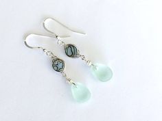 Sea foam sea glass earrings, shell, seafoam, drop jewelry, dangle, beach, boho, wedding, summer, oce Elegant Sea Glass Dangle Earrings, Nickel-free Teardrop Recycled Glass Jewelry, Sea Glass Teardrop Earrings As Gift, Teardrop Sea Glass Earrings For Gift, Elegant Sea Glass Jewelry With Ear Wire, Elegant Jewelry With Sea Glass And Ear Wire, Teardrop Sea Glass For Jewelry Making, Adjustable Dangle Sea Glass Jewelry, Handmade Sea Glass Drop Earrings