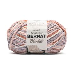 yarn ball with the label bernat blaukraut, light grey and pink