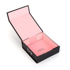 an open black and pink box on a white background