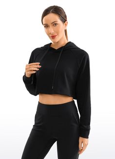 The cotton fabric is soft, slightly thick, and premium durable, with excellent performance of wicking sweat quickly. Loose fit cropped top provide optimal comfort and no restriction to wear. You can pair it with kinds of pants/shorts /skirts. Feature & Fitting: 
 Design for casual or workout wearing 
 Drawstring hooded 
 Crop top length 
 Fabric: 
 Matte look, brushed and soft 
 Enough stretch and premium durability 
 Quick-dry and breathable 
 58%Cotton, 42%Polyester 
 SKU : RZ35 .Easy reac Black Cropped Hoodie With Drawstring Hood, Black Sporty Cropped Hoodie, Casual Black Cropped Hoodie, Black Cropped Sporty Sweatshirt, Athleisure Cropped Hoodie With Relaxed Fit, Sporty Black Cropped Sweatshirt, Comfortable Solid Color Sports Hoodie, Comfortable Solid Sports Hoodie, Casual Cropped Stretch Hoodie