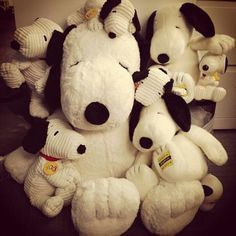 a pile of stuffed dogs sitting next to each other