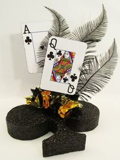 Ace & Queen of Clubs centerpiece - Designs by Ginny Vegas Centerpieces, Casino Themed Centerpieces, 60th Birthday Ideas For Mom, Alice In Wonderland Props, Playing Card Design, Casino Birthday, James Bond Theme, Casino Theme Party Decorations, Vegas Theme