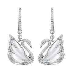 SWAROVSKI FAITHFUL SWAN EARRINGS. Amazing expression of swan symbolizes the purity of love. - 18K White Gold - 2ct engraved Rock Quartz and Diamond Setting - Size: 2.9 cm New without Tags (never worn) *Swarovski box included RETAIL: $5,000 Swan Earrings, Swarovski Butterfly, Swan Jewelry, Swarovski Swan, Boot Jewelry, White Swan, Modern Necklaces, White Necklace, Fancy Jewelry