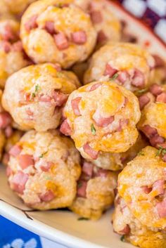 a plate full of ham and cheese balls