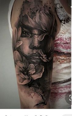 a woman's face with flowers on her arm, and the words in black ink