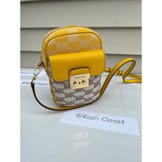 100% Guaranteed Authentic Michael Kors !! **Firm On Price ** Michael Kors Sloan Editor Small Phone Logo Jacquard Crossbody Details: Logo Jacquard 78.5% Cotton/21.5% Polyester Trim 1: 60% Polyurethane/20% Cotton/20% Polyester Gold-Tone Hardware Dimensions : 7”H X 4.5”W X 2” D Approx Adjustable Strap: 15.75”-25” Approx Exterior Details: Back Slip Pockets, Front Pocket Interior Details: 3 Credit Card Slots Lining: 100% Polyester Imported Color : Butter Multi Size : Small Msrp : $348 **Comes From Sm Yellow Michael Kors Travel Bag, Michael Kors Yellow Travel Shoulder Bag, Michael Kors Yellow Shoulder Bag For Travel, Michael Kors Crossbody Shoulder Bag With Cell Phone Pocket, Michael Kors Crossbody Bag With Cell Phone Pocket, Michael Kors Rectangular Shoulder Bag With Cell Phone Pocket, Michael Kors Yellow Rectangular Shoulder Bag, Large Crossbody Purse, Messanger Bag