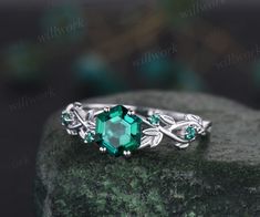 This ring is handmade by myself. The main stone is a 7x7mm hexagon cut lab emerald, about 1.5ct. The accent stones are lab emeralds. The material is solid 14k gold(white,yellow,rose gold is also available) Ring size can be choose from the selection box. This jewelry can also be made in solid 10k,14k,18k gold,with real diamonds.Contact me! Need rush order? contact me! Need custom making order? Contact me! I have confidence on my jewelry.30 days money back guarantee!(For returned item,as this is handmade jewelry.Handcrafted fee and shipping fee will be deducted,others will be refunded soon) Thanks for your visiting! Emerald Rings Silver, Green Promise Rings For Her, Emerald Silver Ring, Silver And Emerald Ring, Emerald Silver Engagement Ring, Emerald Promise Ring, Emerald Ring Designs For Women, Vintage Emerald Ring, Nature-inspired Emerald Rings For Gift