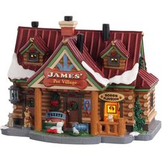 a toy store with christmas decorations on the roof and snow on the roof, in front of a white background