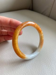 "🌈 Jade Bangle 53.4mm (2.10\"), Round Shape, Light Green & Yellow Brown 🌷 Untreated Natural Jadeite/ Grade A Jade 🌷 Certified : Yes 🌷 Jade from Myanmar/ Burma 🌷 Shape : Round 🌷 Inner diameter : 53.4mm / 2.10\" ��🌷 Width & Thickness : 8.3 x 8.6mm 🌷 Color : Light Green & Yellow Brown 🌷 Free standard shipping from Hong Kong with tracking included 🌷 Take approximately 7-21 days to arrive worldwide" White Carved Bracelets, White Carved Round Bracelet, Yellow Jade Round Jewelry, Yellow Round Jade Jewelry, Round Yellow Jade Jewelry, Handmade Orange Round Bangle, Lavender Green, Light Lavender, Jade Bangle