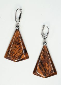 The earrings are one of a kind and handmade from Bocote wood and have very smooth and brilliant cut  surface. Lever backs are Rhodium  plated. Care instructions: Avoid direct contact with perfumes, alcohol, water and other solvents that may damage wood finish. Wipe jewelry with soft dry cloth. Brown Teardrop Earrings For Formal Occasions, Formal Brown Teardrop Earrings, Modern Brown Earrings For Formal Occasions, Brown Wooden Earrings For Pierced Ears, Unique Brown Wooden Earrings, Modern Brown Earrings For Gift, Elegant Brown Wooden Jewelry, Brown Teardrop Wood Jewelry, Brown Wooden Drop Earrings