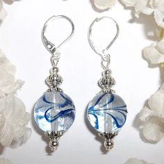 This Gorgeous Beaded Earring Set Was Done With Clear Glass Beads With Navy Blue Swirls. The Pair Have Silver Toned Costume Jewelry Beads That Were Antiqued In Black. They Dangle And Drop From 925 Sterling Silver Lever Backs For Women's Pierced Ears. Measure 1 3/4 Inches Tall & Almost 5/8 Inches Wide. Each Single Earring Weighs 4.3 Grams. A Cute Set To Wear With Denim Jeans! Brand New & Handmade By Me - Wvluckygirl. Great Gift Idea For Her! Buy It Now Before Someone Else Does!!! Dangly Dangling E Blue Teardrop Jewelry With Silver Beads, Nickel-free Blue Beaded Earrings For Gifts, Nickel-free Blue Beaded Earrings As Gift, Blue Dangle Earrings With Silver Beads, Blue Glass Jewelry With Dangling Beads, Nickel-free Blue Round Bead Jewelry, Nickel-free Blue Beaded Sterling Silver Earrings, Silver Glass Beaded Dangle Earrings, Blue Silver Beaded Drop Earrings