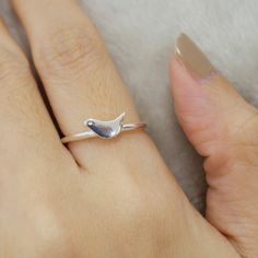 Sterling Silver Bird Ring,Dainty Silver Ring,Bird Jewelry,Tiny Bird Ring,Delicate Bird Ring,Silver Bird Band,Stacking Bird Ring,Bird RingGift special and meaningful jewelry for Mothers, Sisters, Friends.Material:sterling silveradjustable ringJUST 925 STERLING SILVERuse 925 Sterling Silver. nice shine and safe for your body. Sterling silver will oxidation after some time this is a normal process, just use polishing cloth or a polishing lotion or Toothpaste, detergent at home for that nice shine.T Silver Bird Ring, Dainty Silver Ring, Bird Ring, Bird Rings, Silver Bird, Tiny Bird, Meaningful Jewelry, Bird Jewelry, Ring Dainty