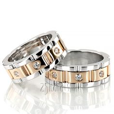 two gold and silver wedding rings with diamonds