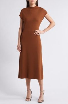 A staple sweater-dress is knit with a neat mock neck and falls to a beloved and versatile midi length. 49" length (size Medium) Slips on over head Mock neck Short sleeves Unlined 65% rayon, 35% nylon Hand wash, dry flat Imported Stretch Knit Midi Dress, Chic Midi Dress With Crew Neck For Work, Casual Midi Sweater Dress For Work, Classic Ribbed Midi Dress For Fall, Fitted Brown Midi Length Sweater Dress, Fitted Brown Midi Sweater Dress, Turtleneck Stretch Midi Dress For Work, Stretch Turtleneck Midi Dress For Work, Casual Turtleneck Midi Dress