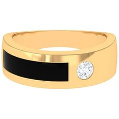 a black and gold ring with a diamond