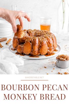 bourbon pecan monkey bread on a white plate with the words bourbon pecan monkey bread