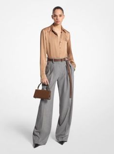 These wide-leg trousers combine timeless tailoring elements, like front pleats and crisp leg creases, with stretch-infused virgin wool sourced from an Italian mill. A high-rise fit evokes a strong feminine aesthetic. Balance its soft hand and languid drape with pointed-toe heels. Made in Italy. Luxury Wide Leg Pants With Pressed Crease, Luxury Wool Wide Leg Pants, Luxury Tailored Wide Leg Pants, Luxury Wide Leg Dress Pants For Work, Luxury Tailored Wide Leg Pants For Workwear, Luxury Tailored Wide Leg Pants For Office, Fall Business Wide Leg Pants With Pressed Crease, Luxury Wide Leg Pants With Belt Loops For Work, Luxury Wide Leg Pants For Business Casual