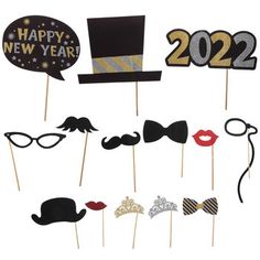 new year's eve photo booth props with top hats, mustaches and glasses