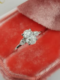 an engagement ring in a velvet box