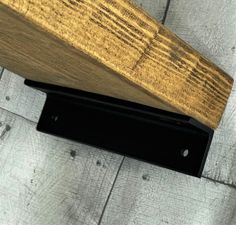 a close up view of a wooden beam on the floor