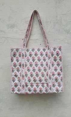 The Indian Hand Block Printed Cotton Quilted Women's Handbags from Rajasthan India. This Handbag is completely Indian Printed on good quality cotton. Cotton quilted travel Bag made by Indian Artisans, this cotton quilted shopping bag is totally unique and multi purpose. Use this for your grocery or as a travel bag. Perfect to suit all. Perfect Gift For her Item :- Cotton Handbag Material: 100% Cotton Pattern: Floral Print Was Care - Home Washable Style: Tote Bag Tote Bag -  Color - (Pink Buti ) Vintage Tote Bag, Cotton Handbag, Grocery Shopping Bags, Quilted Tote Bags, Quilted Totes, Kids Items, Sustainable Gifts, Handmade Bag, Bag Vintage