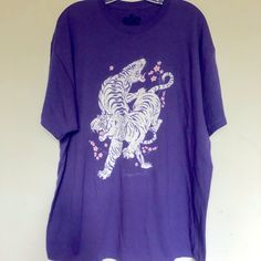 Oversized Tiger T Shirt Size Xl Made From A Soft Washed Down Cotton With Short Sleeves 100% Cotton New Perfect For Men Or Women Chest 24.5” Length 31” Oversized Tiger T Shirt Purple Screen Print Shirt With Relaxed Fit, Purple Relaxed Fit Screen Print Shirt, Purple Relaxed Fit Graphic Tee, Purple Cotton Graphic Tee Shirt, Casual Purple Screen Print Shirt, Purple Graphic Tee With Relaxed Fit, Relaxed Fit Purple Shirt With Graphic Print, Purple Relaxed Fit Shirt For Streetwear, Purple Crew Neck Shirt With Screen Print