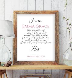 a framed print with the words i am emma grace